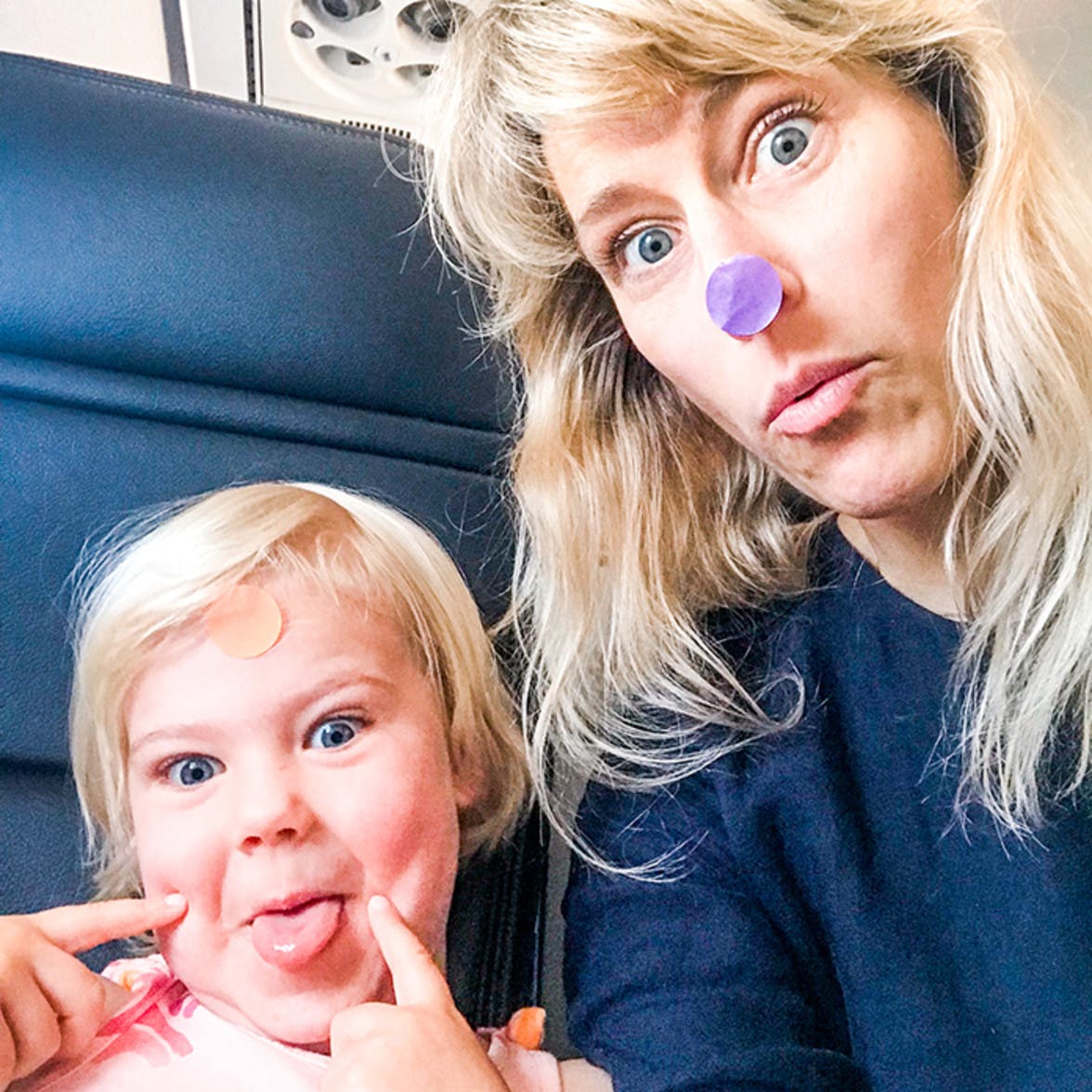 Mother and daughter with dot stickers on their face