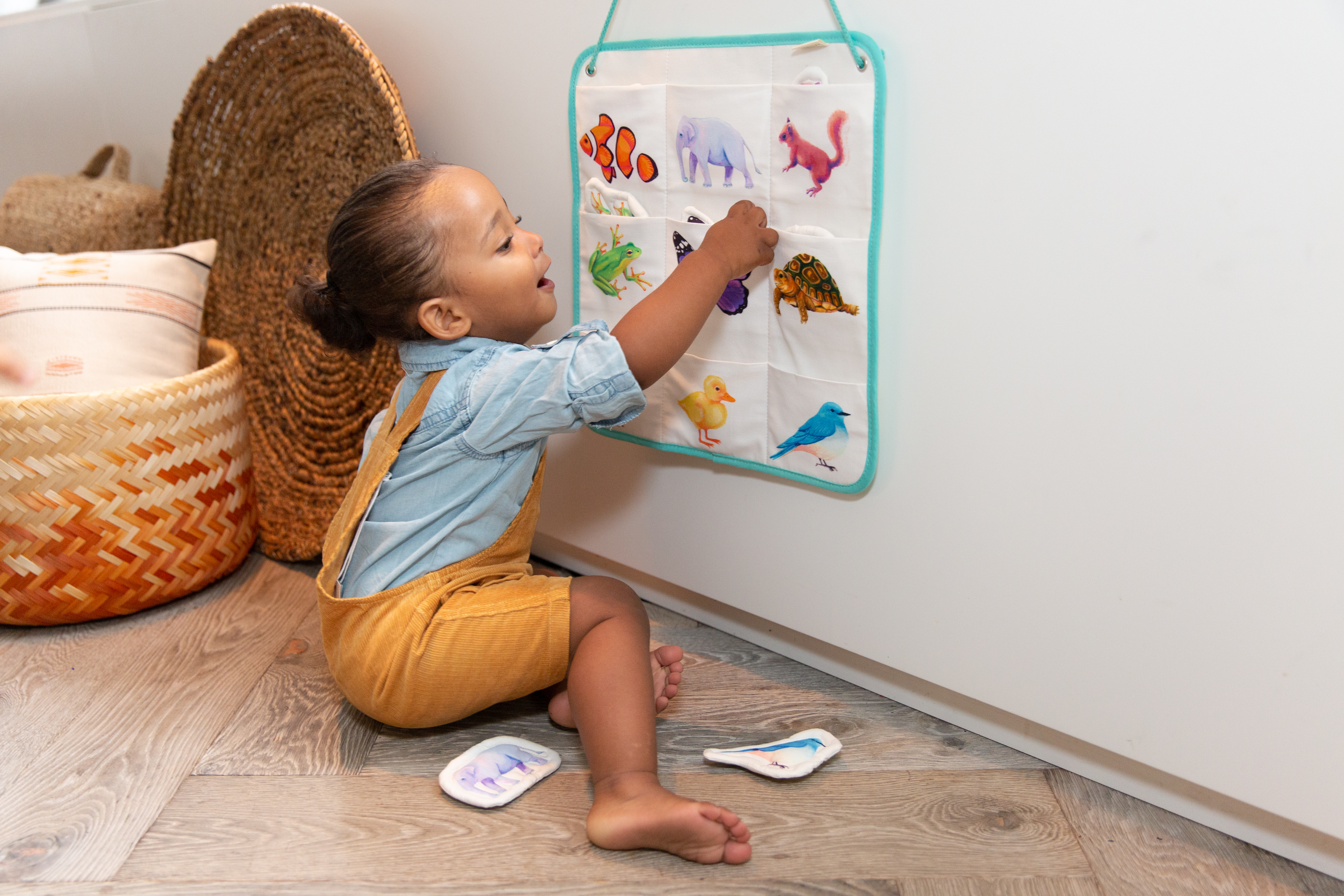 Toddler matching animals in the Quilter Critters toy by Lovevery