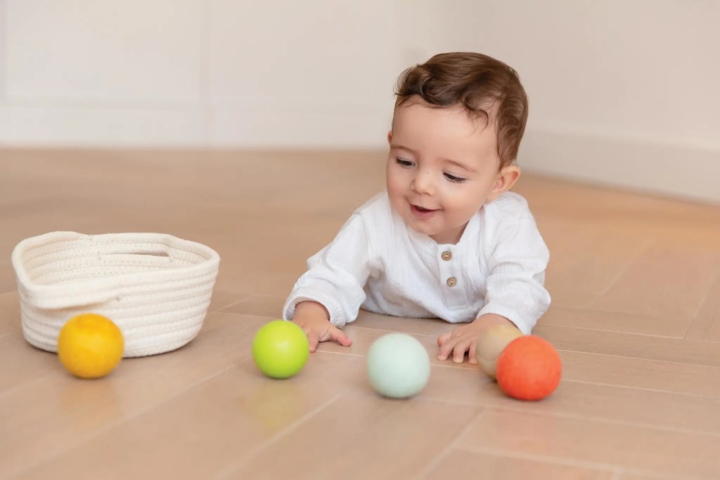 Child looking at balls from Lovevery